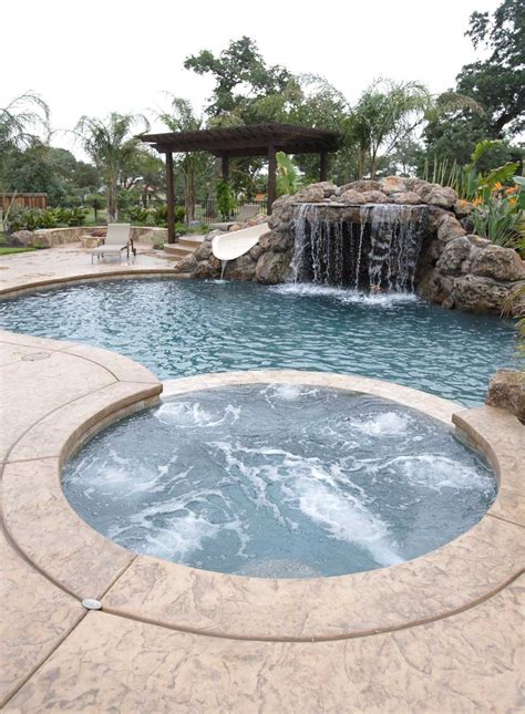 With the perfect balance of stamped concrete and lush greenery, this backyard swimming pool idea beckons. Unique Pool Designs - Hayward POOLSIDE Blog