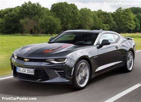 The Chevrolet Camaro Is Driving Down The Road