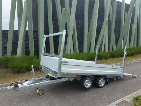 Het kippen van stortgoederen en vervoer van machines! TwinTrailer Kipper/Transporter - Van Raaij Aanhangwagens