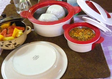 Tuwon shinkafa with miyan kuka. Tuwon shinkafa and egussi soup (broken rice meal) with ...