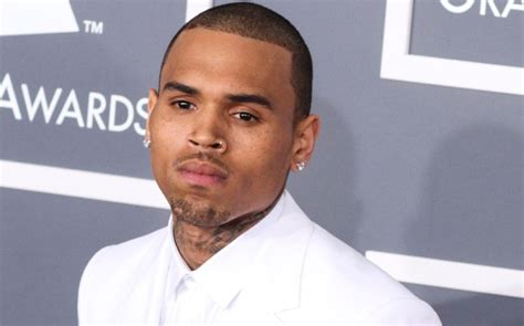 Chris Browns Best Outfits Through The Years Photos Footwear News