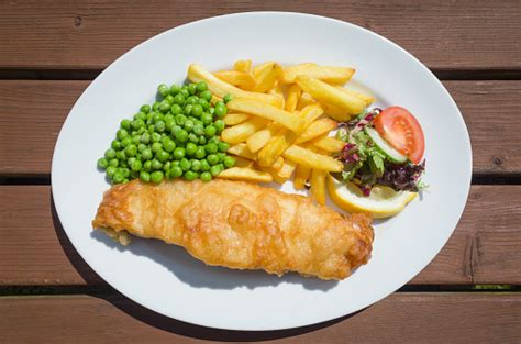 Fish And Chips With Peas On A Plate Stock Photo Download Image Now