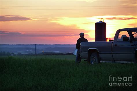 A Farmer On His Truck Watching A Sunset By Susanhsmith