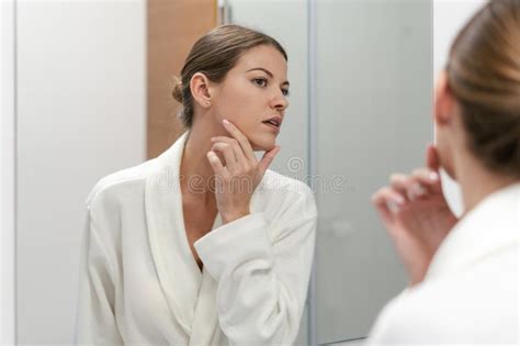 Woman Bathrobe Checking Her Face Mirror Stock Photos Free And Royalty