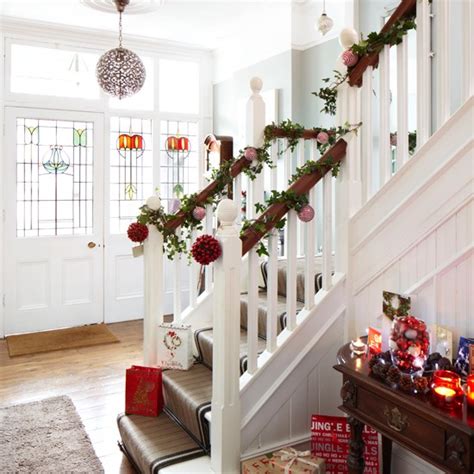 We want to help change that with a staircase full of ideas that help your hallway reach new stylish heights. White Christmas hallway | housetohome.co.uk