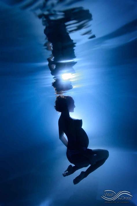 Yaninas Maternity Shoot Underwater Pool Portraits With Her Husband Wash The Dress