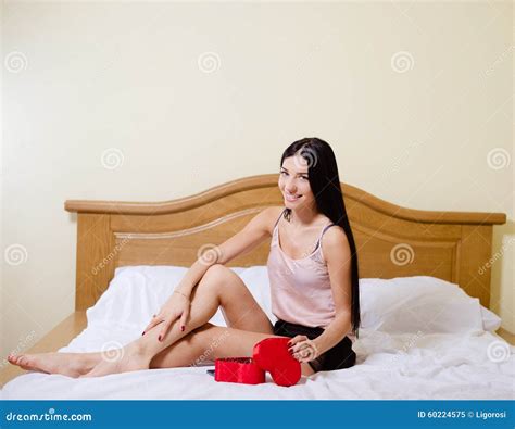 Girl Sitting On Bed With Crossed Legs Opening Stock Image Image Of