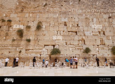 Worshippers Say Their Prayers At The Western Wall On A Sunny Afternoon