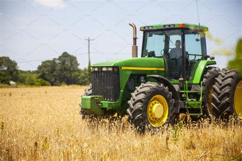 Tractor In Field High Quality Industrial Stock Photos ~ Creative Market
