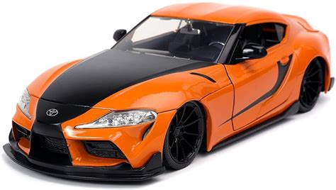 Hans 2020 Toyota Supra Orange Jada Toys 32097 124 Scale Diecast