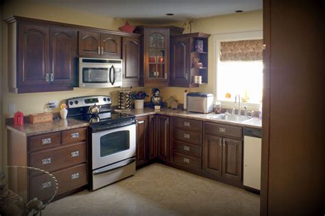 The kitchen is still usable during the refacing project. Island Cabinet Shop quality built kitchen cabinets, supplied by HubCraft Timber Mart. | Building ...