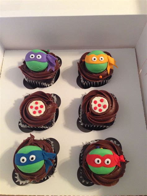 Six Cupcakes In A Box Decorated With Teenage Mutant And Ninja Turtle