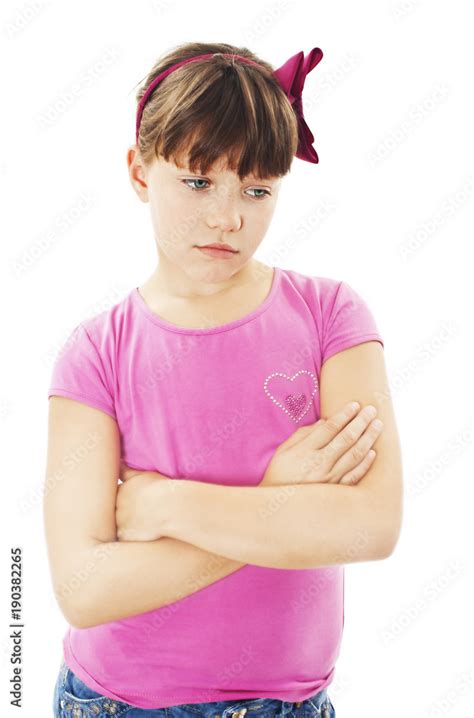 Sulky Angry Young Girl Child Sulking And Pouting Isolated On White