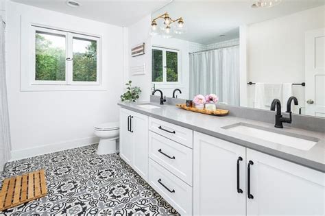 Quartz is one of the most beautiful and durable countertop materials you can have in your home. White, gray, and black cement bathroom floor tiles ...