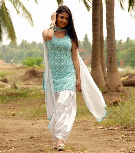 South Indian Actress Rachana Malhotra In Turquoise And White Colour