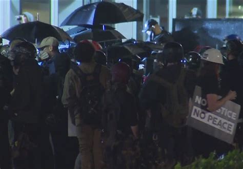 portland police declare riot as protesters gather outside north precinct s bureau video