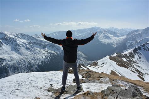 Man Standing On Mountain · Free Stock Photo
