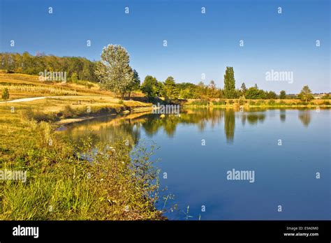Blue Lake And Green Landscape Stock Photo Alamy