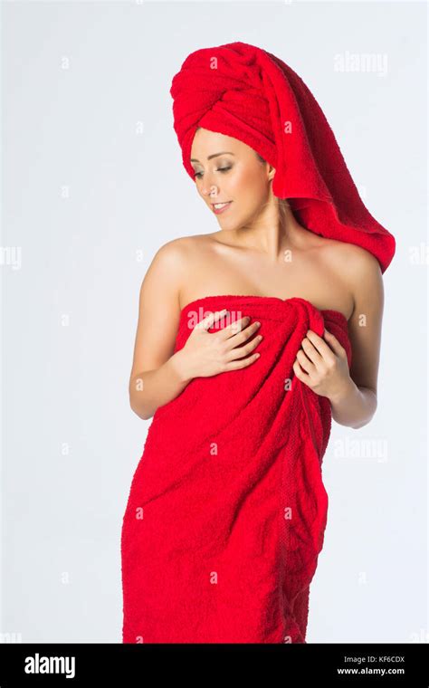 Beautiful Woman Wrapped With Red Towels After Shower Stock Photo Alamy