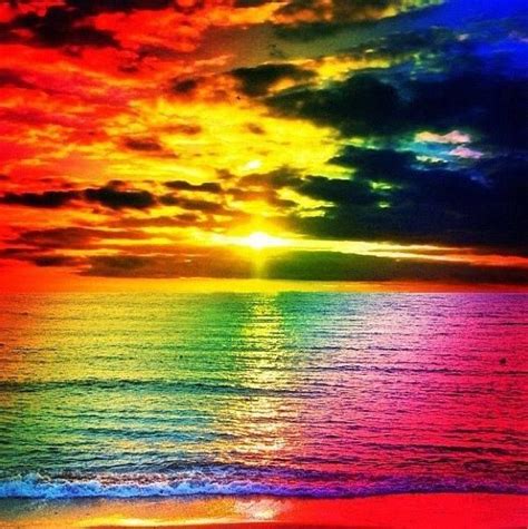 Behold The Captivating Beauty Of A Rainbow Sunset