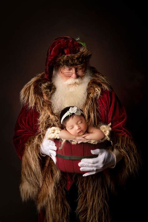 Christmas Photo Of Santa Holding Baby In 2021 Newborn Photographing