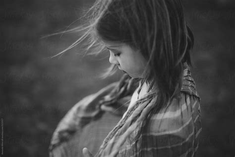 Dramatic Black And White Profile Portrait Of Serious Young Girl By