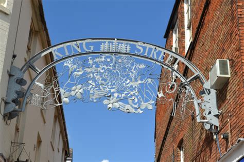 Maybe you would like to learn more about one of these? King Street ornamental metal arch © Robin Stott ...