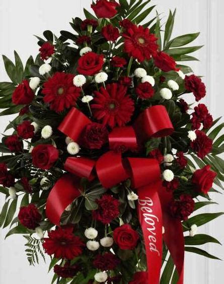 If you wish to discuss your particular requirements please call us. Standing Spray - Red - Funeral Flowers Stockton-on-Tees