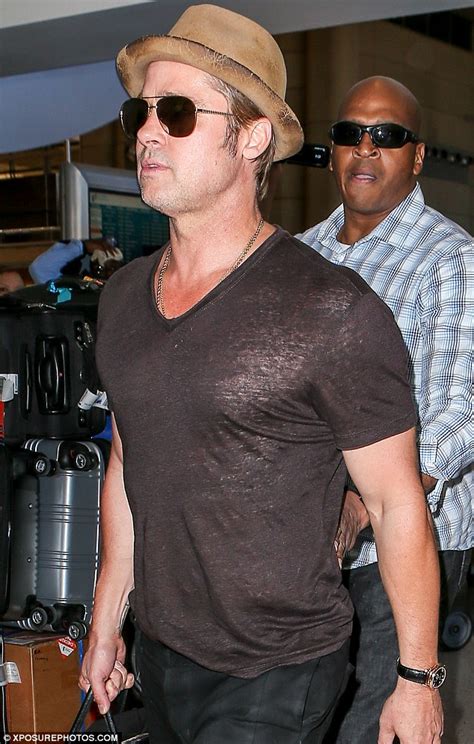 Brad Pitt Shows Off His Beefcake Body In A See Through T Shirt Daily Mail Online