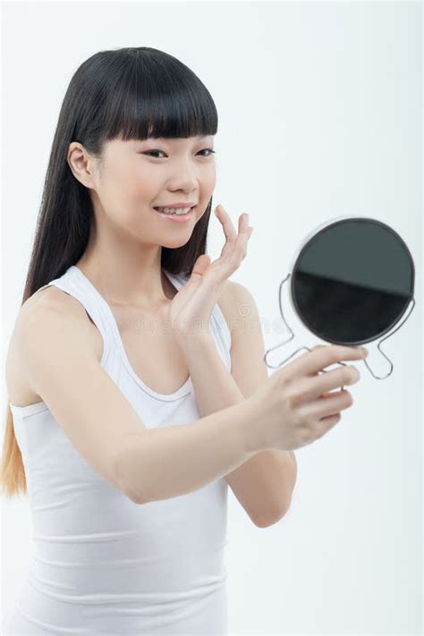Beautiful Slim Chinese Girl Is Doing Make Up Stock Image Image Of