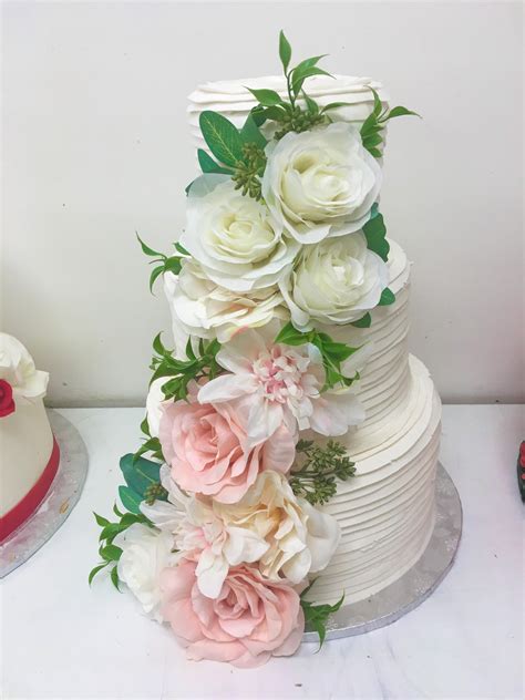 So Much Floral 😻 Call Us Today To Set Up Your Wedding Cake Consultation
