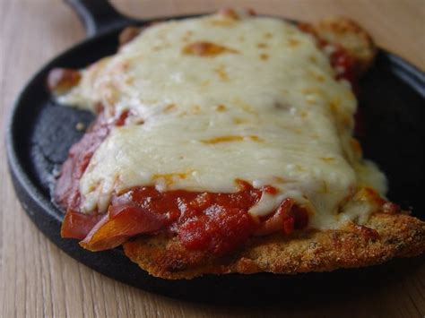 With this recipe you can learn how to make steak milanesa in the oven! Milanesa a la Napolitana... a beef cutlet, breaded and ...