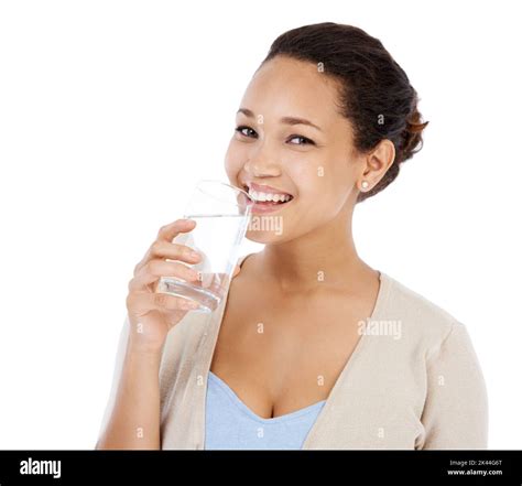 Getting Some Water To Quench Her Thirst Young Woman Smiling While