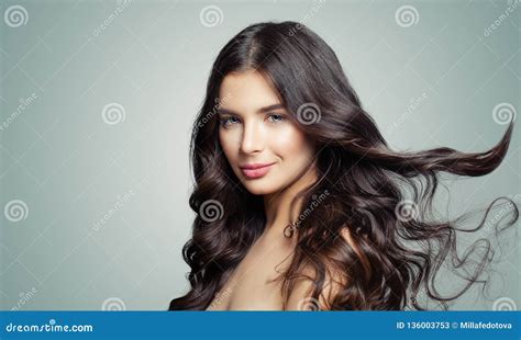 Young Beautiful Woman With Long Blowing Hair Hair Care And Beauty