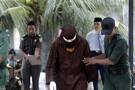 unmarried couples are whipped for breaking sharia law in indonesia daily mail online