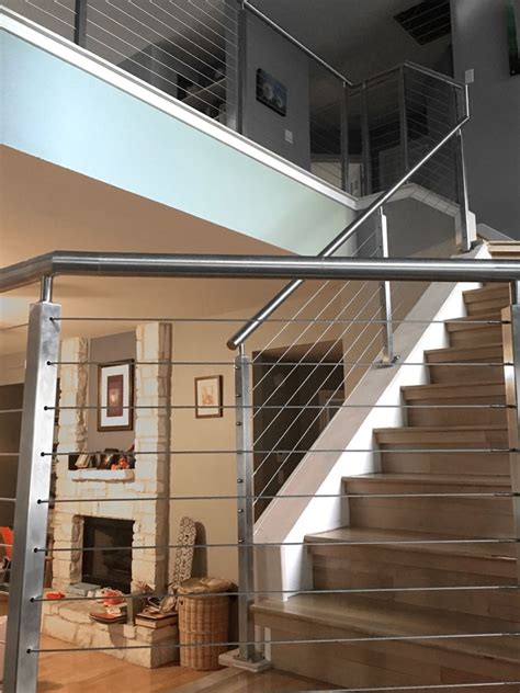 Learn how to install iron balusters! Typical to Extraordinary: Cable Railing Staircase ...