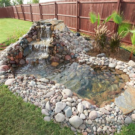 Summer is rapidly approaching and it's time to start planning your backyard oasis with not just shrubbery but considering the addition of a pond design. 20+ DIY Backyard Pond Ideas On A Budget That You Will Love