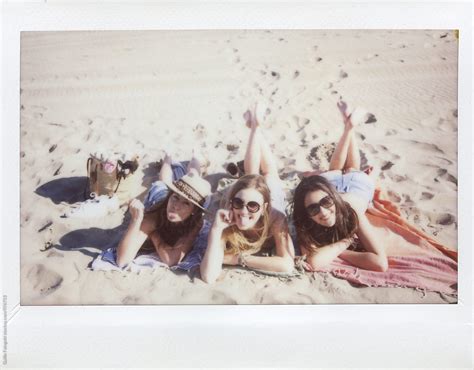 Three Smiling Girlfriends On Beach Blanket By Stocksy Contributor Guille Faingold Stocksy