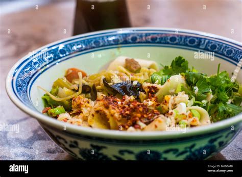 A Bowl Of Biang Biang Noodles In The Muslim Quarter Of Xi’an China Sour Plum Juice Drink