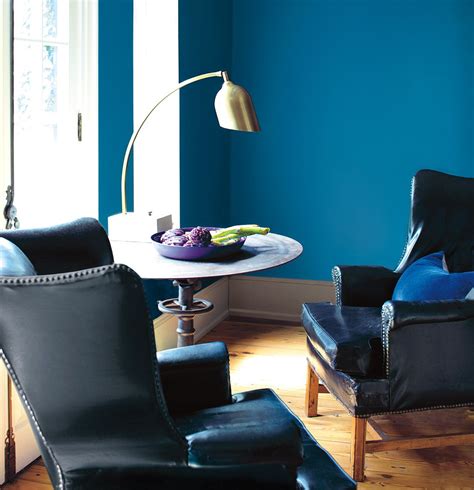 Enveloped By Cobalt Walls This Lovely Sitting Room Corner Features Two