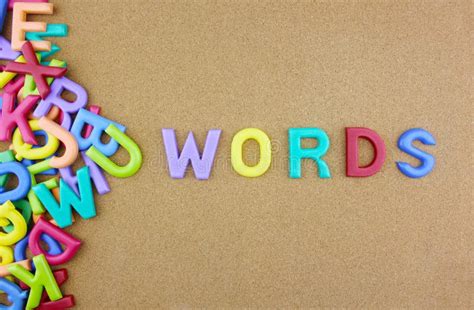 The Colorful Word Words Next To A Pile Of Other Letters Stock Image