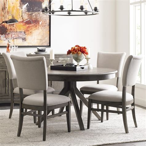 Relax in style with dining chairs that make everyday meals extra special. Kincaid Furniture Cascade Round Dining Table Set with 4 ...