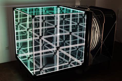 This Light Bending Cube Of One Way Mirrors Will Really Trip You Out