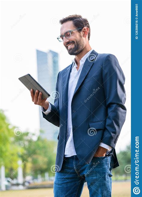 Stylish Businessman Looking At Digital Tablet Stock Photo Image Of