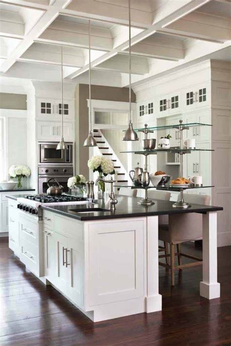 This cylindrical hood, along with a literal ball of light and wispy wire stools, shows contemporary kitchens can be fun as well as functional. 30+ Brilliant kitchen island ideas that make a statement