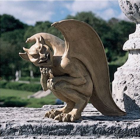 gothic mischievous devilish gargoyle sculpture medieval