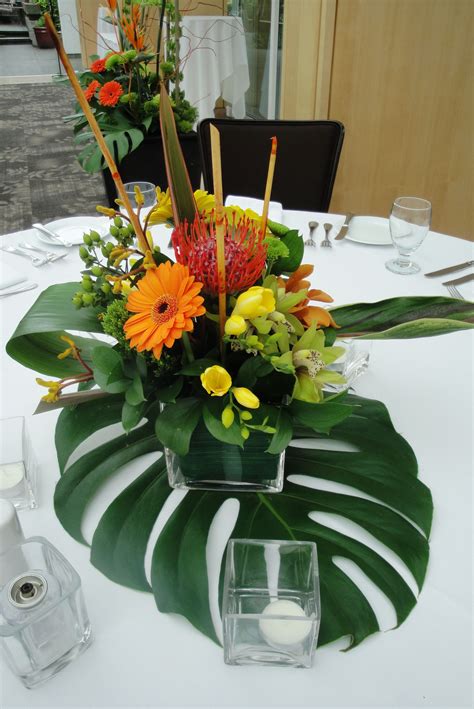 tropical floral centerpieces | Tropical wedding centerpieces, Tropical