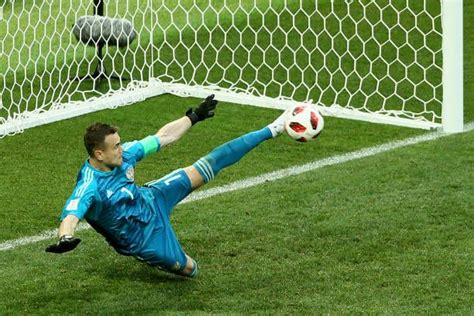 Igor Akinfeev Of Russia Saves The Fifth Penalty From Iago Aspas Of
