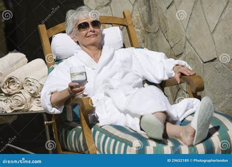 Woman Relaxing On Lounge Chair Stock Image Image Of Beautiful Caucasian
