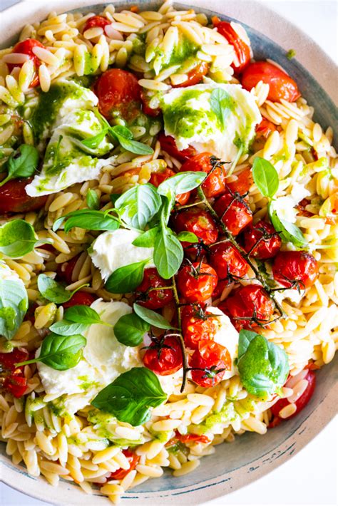 warm orzo salad with roasted tomatoes mozzarella and basil simply delicious